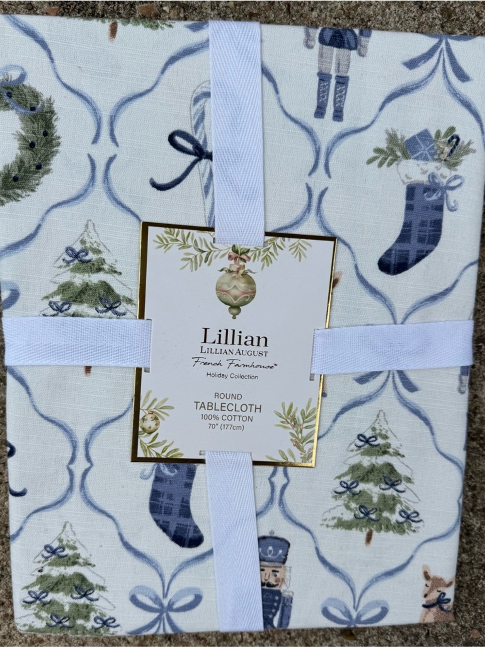 Lillian August Round Holiday Tablecloth in Blue Farmhouse Nutcracker Christmas